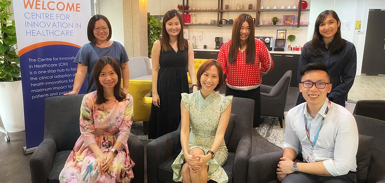 Dr Rina Lim (centre) with her team at NUHS CIH, who are committed to supporting healthcare start-ups create valuable products and accelerating their time from development to clinical adoption.